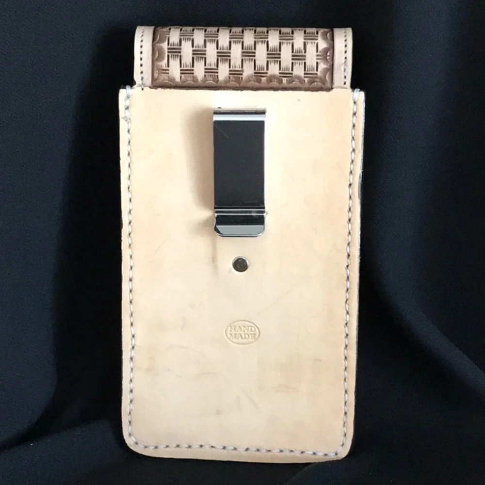 Handmade all leather cell phone carrier.